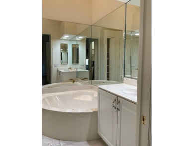 Lake front Coach Home in Premier tree-lined Golf Community 
 on Kensington Golf and Country Club in Florida - for sale on GolfHomes.com, golf home, golf lot