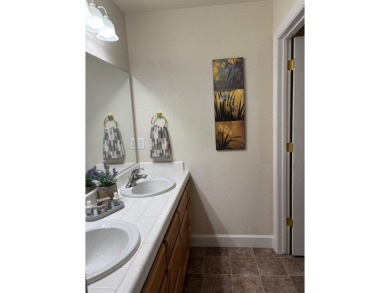 This beautiful 1722sf townhome boasts 3 primary suites and an on Forest Meadows Golf Course in California - for sale on GolfHomes.com, golf home, golf lot