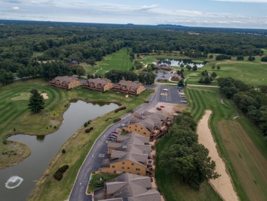 Spacious & Fully Furnished Condo in Northern Bay! This 4-bedroom on Northern Bay Golf Resort and Marina in Wisconsin - for sale on GolfHomes.com, golf home, golf lot