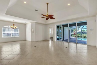 Welcome Home to Longshore Lake! From the moment you step inside on Quail Village Golf Course in Florida - for sale on GolfHomes.com, golf home, golf lot