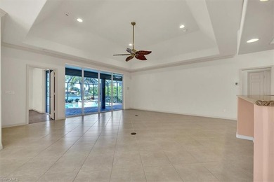 Welcome Home to Longshore Lake! From the moment you step inside on Quail Village Golf Course in Florida - for sale on GolfHomes.com, golf home, golf lot