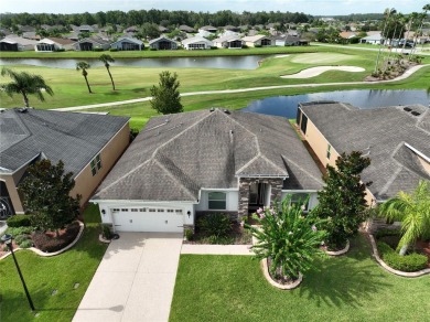 Prime Location! This exquisite residence, boasting an airy on Tampa Bay Golf and Country Club in Florida - for sale on GolfHomes.com, golf home, golf lot