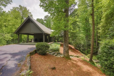 Discover this Holly Forest home in a one-of-a-kind setting with on Sapphire National Golf Club in North Carolina - for sale on GolfHomes.com, golf home, golf lot
