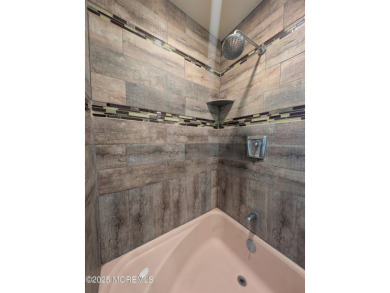 Lovely upper level Andover model with peaceful lakeviews from on Greenbriar Woodlands in New Jersey - for sale on GolfHomes.com, golf home, golf lot