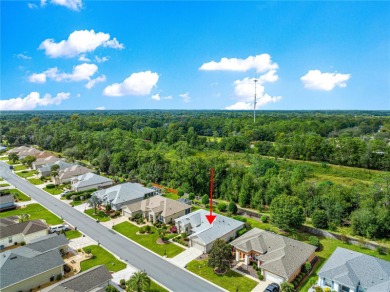 Step into a world of refined elegance and modern comfort in this on Eagle Ridge At Spruce Creek Country Club in Florida - for sale on GolfHomes.com, golf home, golf lot
