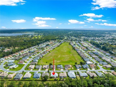 Step into a world of refined elegance and modern comfort in this on Eagle Ridge At Spruce Creek Country Club in Florida - for sale on GolfHomes.com, golf home, golf lot