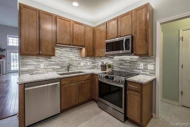 Immaculate condo in the highly sought-after Links of on The Fountains Golf Club in Michigan - for sale on GolfHomes.com, golf home, golf lot