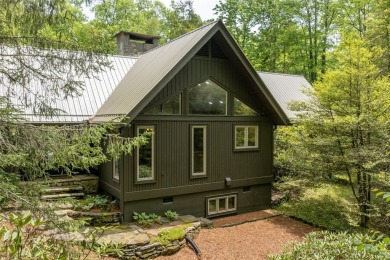 Discover this Holly Forest home in a one-of-a-kind setting with on Sapphire National Golf Club in North Carolina - for sale on GolfHomes.com, golf home, golf lot