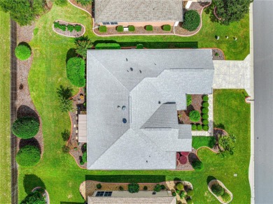 Step into a world of refined elegance and modern comfort in this on Eagle Ridge At Spruce Creek Country Club in Florida - for sale on GolfHomes.com, golf home, golf lot