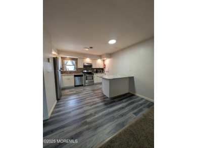 Lovely upper level Andover model with peaceful lakeviews from on Greenbriar Woodlands in New Jersey - for sale on GolfHomes.com, golf home, golf lot