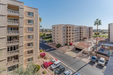 TWO PARKING SPOTS!  Very few units for sale now have 2 parking on Scottsdale Shadows in Arizona - for sale on GolfHomes.com, golf home, golf lot