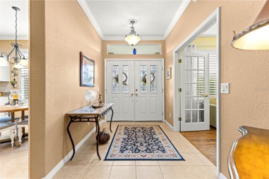 Step into a world of refined elegance and modern comfort in this on Eagle Ridge At Spruce Creek Country Club in Florida - for sale on GolfHomes.com, golf home, golf lot