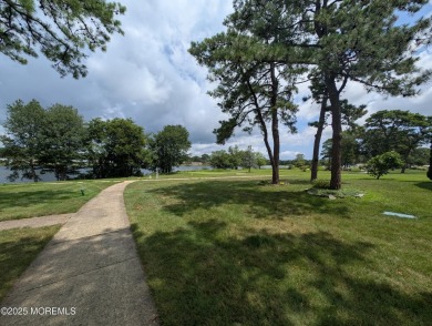 Lovely upper level Andover model with peaceful lakeviews from on Greenbriar Woodlands in New Jersey - for sale on GolfHomes.com, golf home, golf lot
