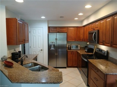 This condo lives like a single family home.  Great tropical on Bonita Bay West in Florida - for sale on GolfHomes.com, golf home, golf lot