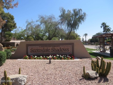TWO PARKING SPOTS!  Very few units for sale now have 2 parking on Scottsdale Shadows in Arizona - for sale on GolfHomes.com, golf home, golf lot