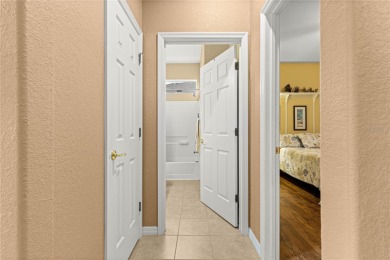 Step into a world of refined elegance and modern comfort in this on Eagle Ridge At Spruce Creek Country Club in Florida - for sale on GolfHomes.com, golf home, golf lot