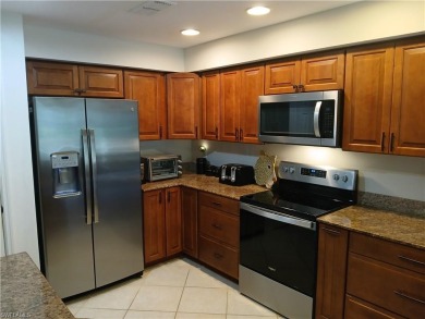 This condo lives like a single family home.  Great tropical on Bonita Bay West in Florida - for sale on GolfHomes.com, golf home, golf lot