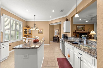 Step into a world of refined elegance and modern comfort in this on Eagle Ridge At Spruce Creek Country Club in Florida - for sale on GolfHomes.com, golf home, golf lot