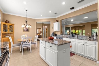 Step into a world of refined elegance and modern comfort in this on Eagle Ridge At Spruce Creek Country Club in Florida - for sale on GolfHomes.com, golf home, golf lot