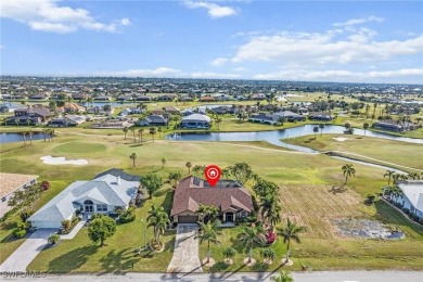 Luxurious lakefront pool home where you'll enjoy scenic golf on Royal Tee Country Club in Florida - for sale on GolfHomes.com, golf home, golf lot