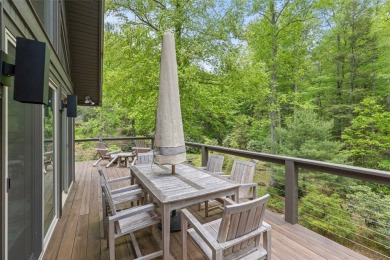 Discover this Holly Forest home in a one-of-a-kind setting with on Sapphire National Golf Club in North Carolina - for sale on GolfHomes.com, golf home, golf lot