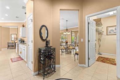 Step into a world of refined elegance and modern comfort in this on Eagle Ridge At Spruce Creek Country Club in Florida - for sale on GolfHomes.com, golf home, golf lot