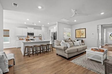 Discover comfort, convenience, and coastal charm at 1016 Saluda on Indigo Creek Golf Club in South Carolina - for sale on GolfHomes.com, golf home, golf lot
