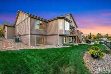 Tranquil lake views enhance the sense of calmness as you enter on Highland Meadows Golf Course in Colorado - for sale on GolfHomes.com, golf home, golf lot