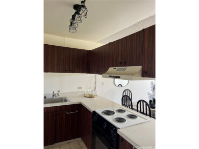 Discover the perfect blend of convenience and charm in this on Honolulu Country Club in Hawaii - for sale on GolfHomes.com, golf home, golf lot