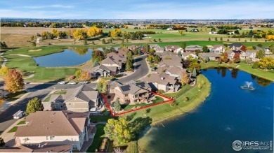 Tranquil lake views enhance the sense of calmness as you enter on Highland Meadows Golf Course in Colorado - for sale on GolfHomes.com, golf home, golf lot