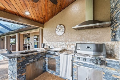 Luxurious lakefront pool home where you'll enjoy scenic golf on Royal Tee Country Club in Florida - for sale on GolfHomes.com, golf home, golf lot