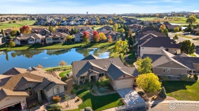 Tranquil lake views enhance the sense of calmness as you enter on Highland Meadows Golf Course in Colorado - for sale on GolfHomes.com, golf home, golf lot