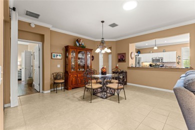 Step into a world of refined elegance and modern comfort in this on Eagle Ridge At Spruce Creek Country Club in Florida - for sale on GolfHomes.com, golf home, golf lot