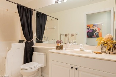 This condo lives like a single family home.  Great tropical on Bonita Bay West in Florida - for sale on GolfHomes.com, golf home, golf lot