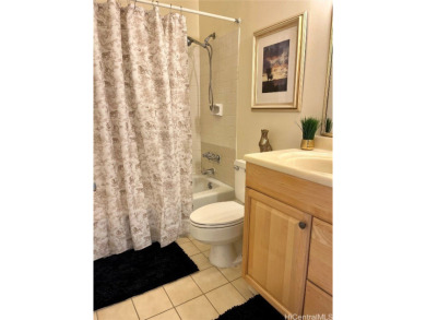Discover the perfect blend of convenience and charm in this on Honolulu Country Club in Hawaii - for sale on GolfHomes.com, golf home, golf lot