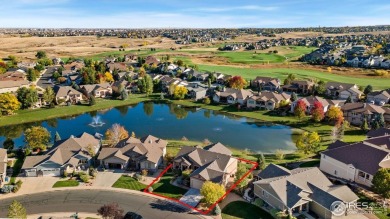 Tranquil lake views enhance the sense of calmness as you enter on Highland Meadows Golf Course in Colorado - for sale on GolfHomes.com, golf home, golf lot