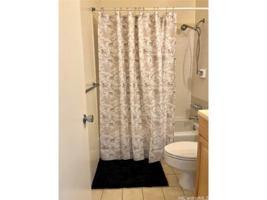 Discover the perfect blend of convenience and charm in this on Honolulu Country Club in Hawaii - for sale on GolfHomes.com, golf home, golf lot
