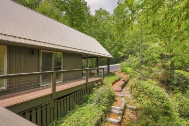 Discover this Holly Forest home in a one-of-a-kind setting with on Sapphire National Golf Club in North Carolina - for sale on GolfHomes.com, golf home, golf lot