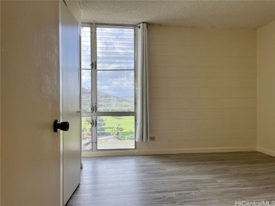 Discover the perfect blend of convenience and charm in this on Honolulu Country Club in Hawaii - for sale on GolfHomes.com, golf home, golf lot