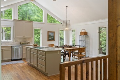 Discover this Holly Forest home in a one-of-a-kind setting with on Sapphire National Golf Club in North Carolina - for sale on GolfHomes.com, golf home, golf lot