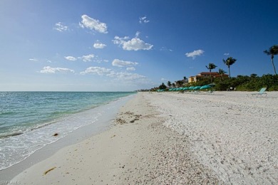 This condo lives like a single family home.  Great tropical on Bonita Bay West in Florida - for sale on GolfHomes.com, golf home, golf lot