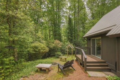 Discover this Holly Forest home in a one-of-a-kind setting with on Sapphire National Golf Club in North Carolina - for sale on GolfHomes.com, golf home, golf lot