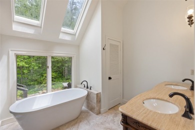 Discover this Holly Forest home in a one-of-a-kind setting with on Sapphire National Golf Club in North Carolina - for sale on GolfHomes.com, golf home, golf lot