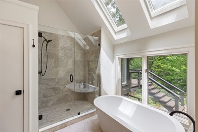 Discover this Holly Forest home in a one-of-a-kind setting with on Sapphire National Golf Club in North Carolina - for sale on GolfHomes.com, golf home, golf lot