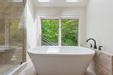 Discover this Holly Forest home in a one-of-a-kind setting with on Sapphire National Golf Club in North Carolina - for sale on GolfHomes.com, golf home, golf lot