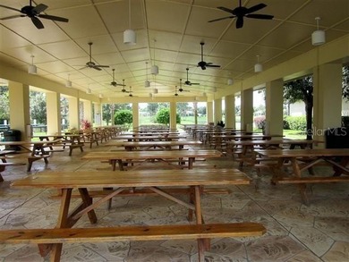 Step into a world of refined elegance and modern comfort in this on Eagle Ridge At Spruce Creek Country Club in Florida - for sale on GolfHomes.com, golf home, golf lot