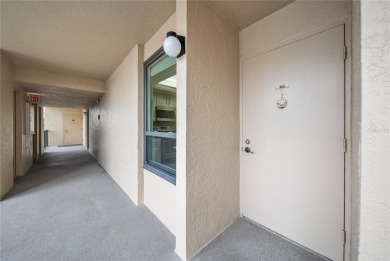 This beautifully updated two-bedroom, two-bath condo in the on Cove Cay Country Club in Florida - for sale on GolfHomes.com, golf home, golf lot