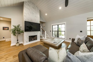 Welcome to your dream lakehouse featuring a boat slip. Enjoy on  in Arkansas - for sale on GolfHomes.com, golf home, golf lot