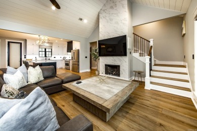 Welcome to your dream lakehouse featuring a boat slip. Enjoy on  in Arkansas - for sale on GolfHomes.com, golf home, golf lot