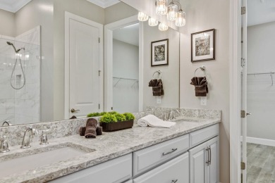 This stunning home overlooking a peaceful lake is located in one on Esplanade Golf and  Country Club in Florida - for sale on GolfHomes.com, golf home, golf lot
